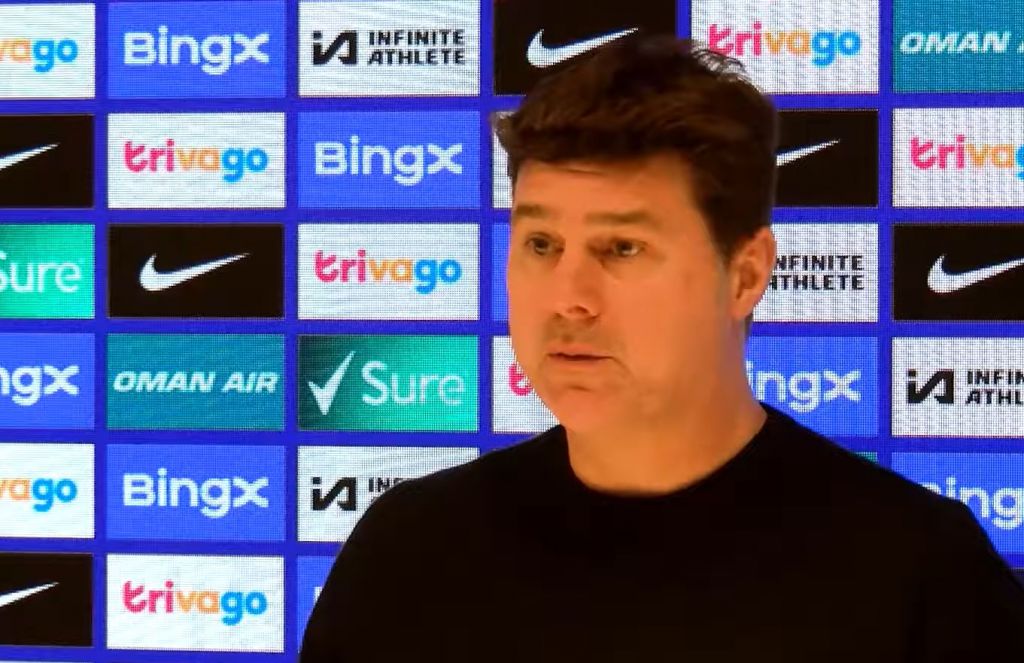 Mauricio Pochettino looks isolated in a press conference.