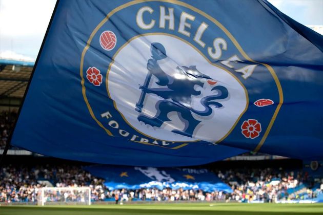 A Chelsea flag waves at Stamford Bridge.