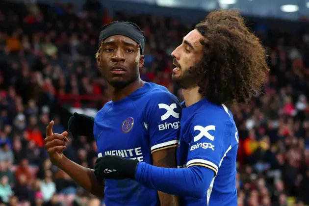 Marc Cucurella and Noni Madueke celebrate a goal.