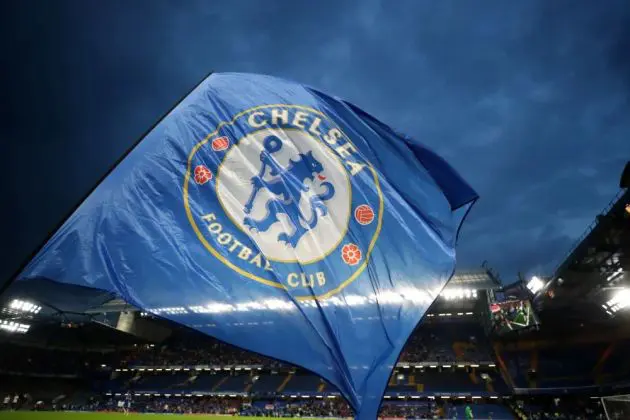 A Chelsea flag in the evening at Stamford Bridge.