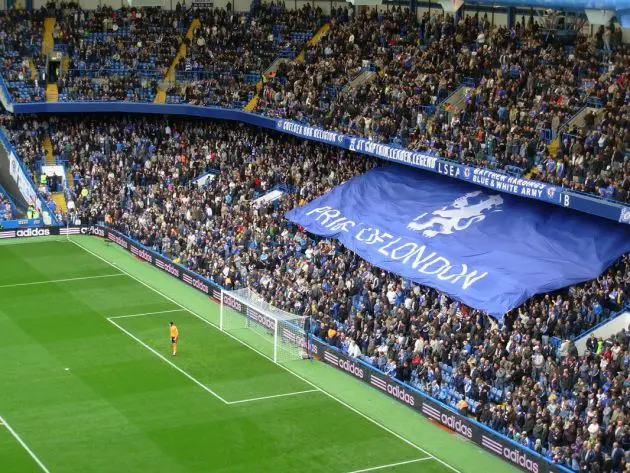 A full Stamford Bridge with the Pride of London banner.