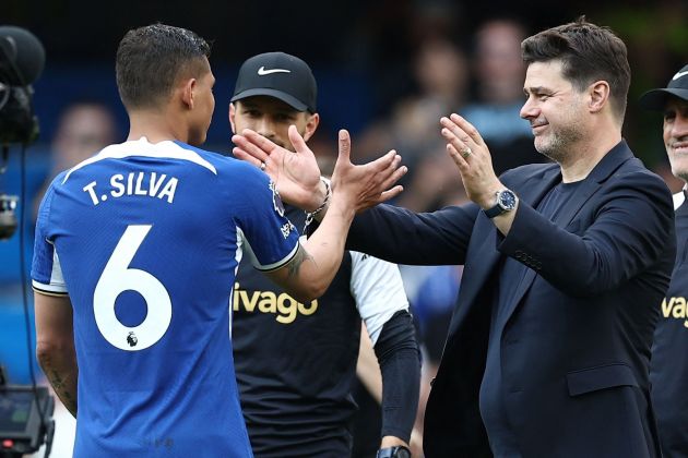 Thiago Silva and Mauricio Pochettino embrace.