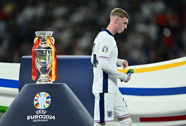 Cole Palmer collects Euro 2024 runners up medal.