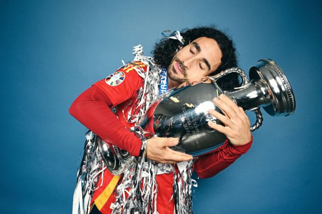 Marc Cucurella with the Euros trophy