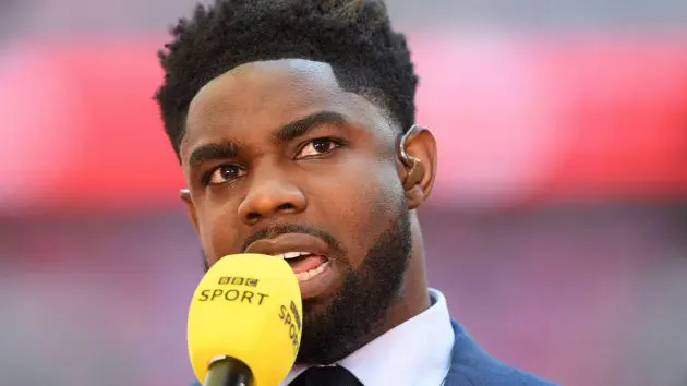 Micah Richards doing punditry for the BBC.