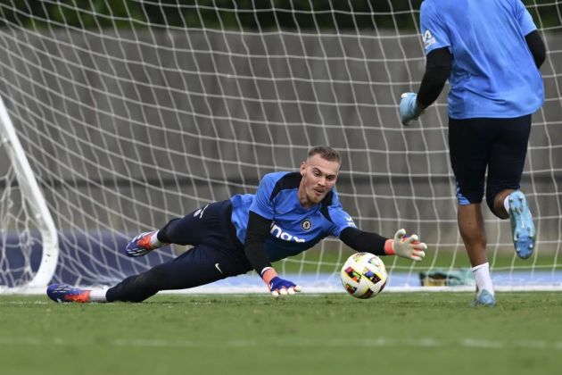 Filip Jorgensen trains with the goalkeepers in the USA.