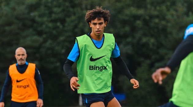 Joao Felix trains watched by Enzo Maresca.