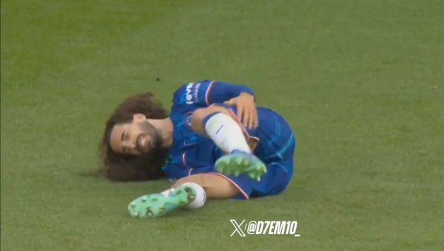 Marc Cucurella cramps up on the pitch.