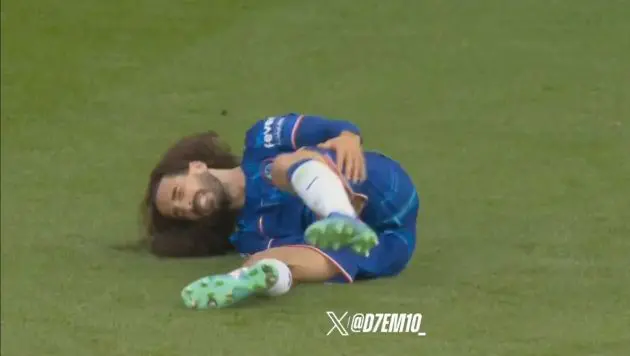 Marc Cucurella cramps up on the pitch.