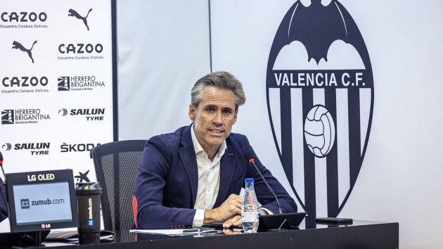 Miguel Angel Corona working for Valencia.