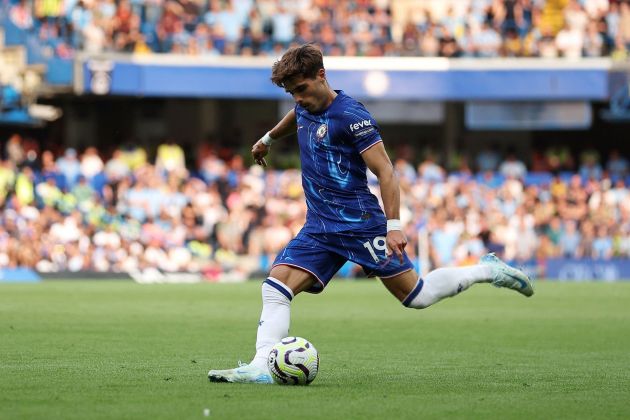 Pedro Neto crosses the ball for Chelsea.