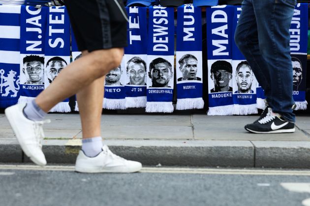 Generic shot of Chelsea scarfs. (Photo by Adrian DENNIS / AFP)