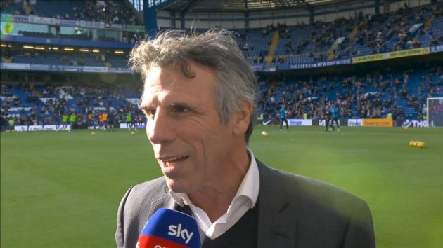 Chelsea icon Gianfranco Zola speaking on the pitch at Stamford Bridge.