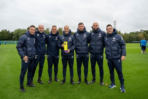 Enzo Maresca and his staff celebrate the Manager of the Month award at Cobham.