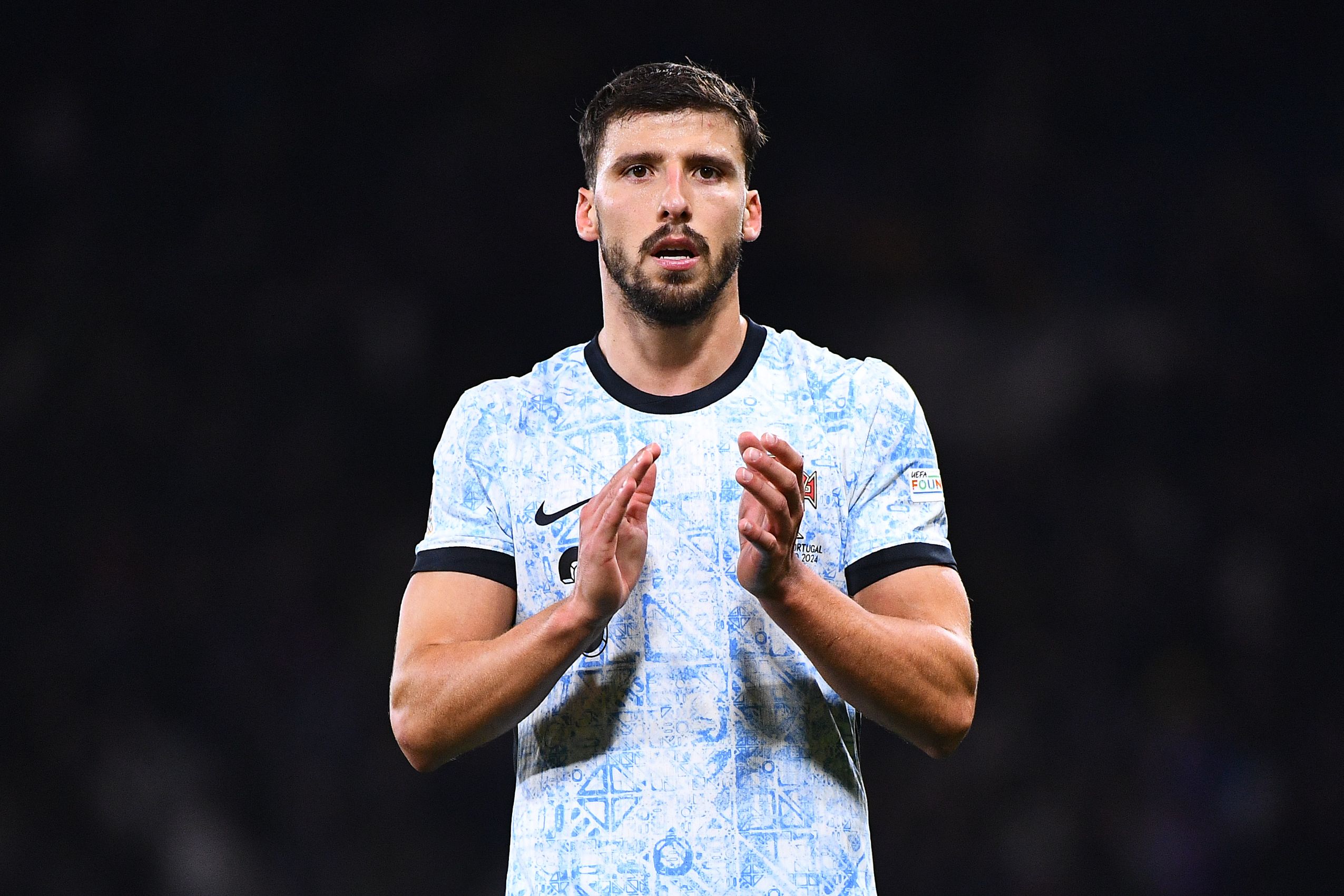 Ruben Dias applauds Portugal fans. (Photo by Euan Cherry/Getty Images)