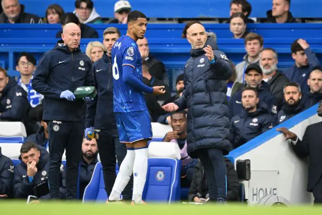 Levi Colwill talks to Enzo Maresca before being subbed off. (Photo by Clive Mason/Getty Images)