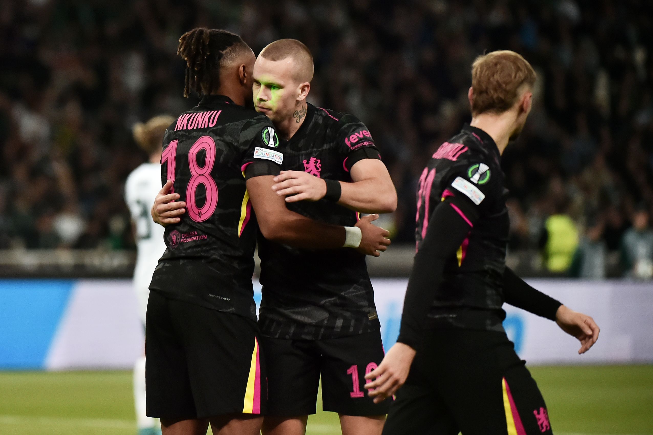 C v Chelsea FC - UEFA Conference League 2024/25 League Phase MD2 ATHENS, GREECE - OCTOBER 24: Mykhaylo Mudryk of Chelsea celebrates scoring his team's second goal with teammate Christopher Nkunku, as green lasers are seen pointing at his face, during the UEFA Conference League 2024/25 League Phase MD2 match between Panathinaikos FC and Chelsea FC at Olympic Athletic Center of Athens Spyridon Louis or OAKA on October 24, 2024(Photo by Milos Bicanski/Getty Images)