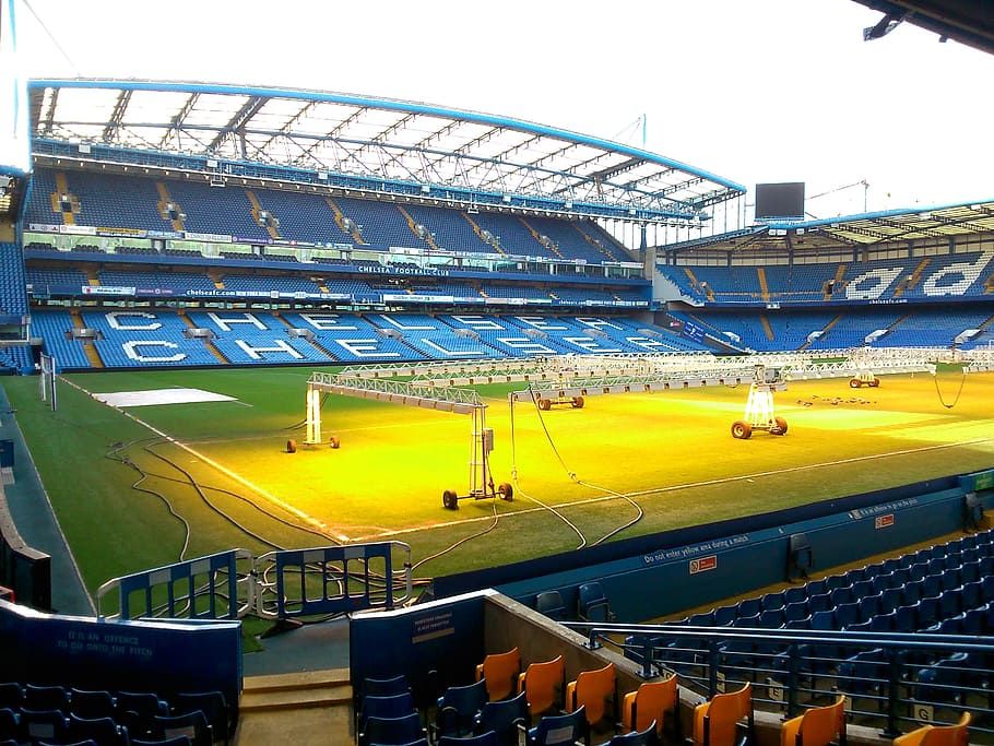 Stamford Bridge pitch with turf growing lamps on.