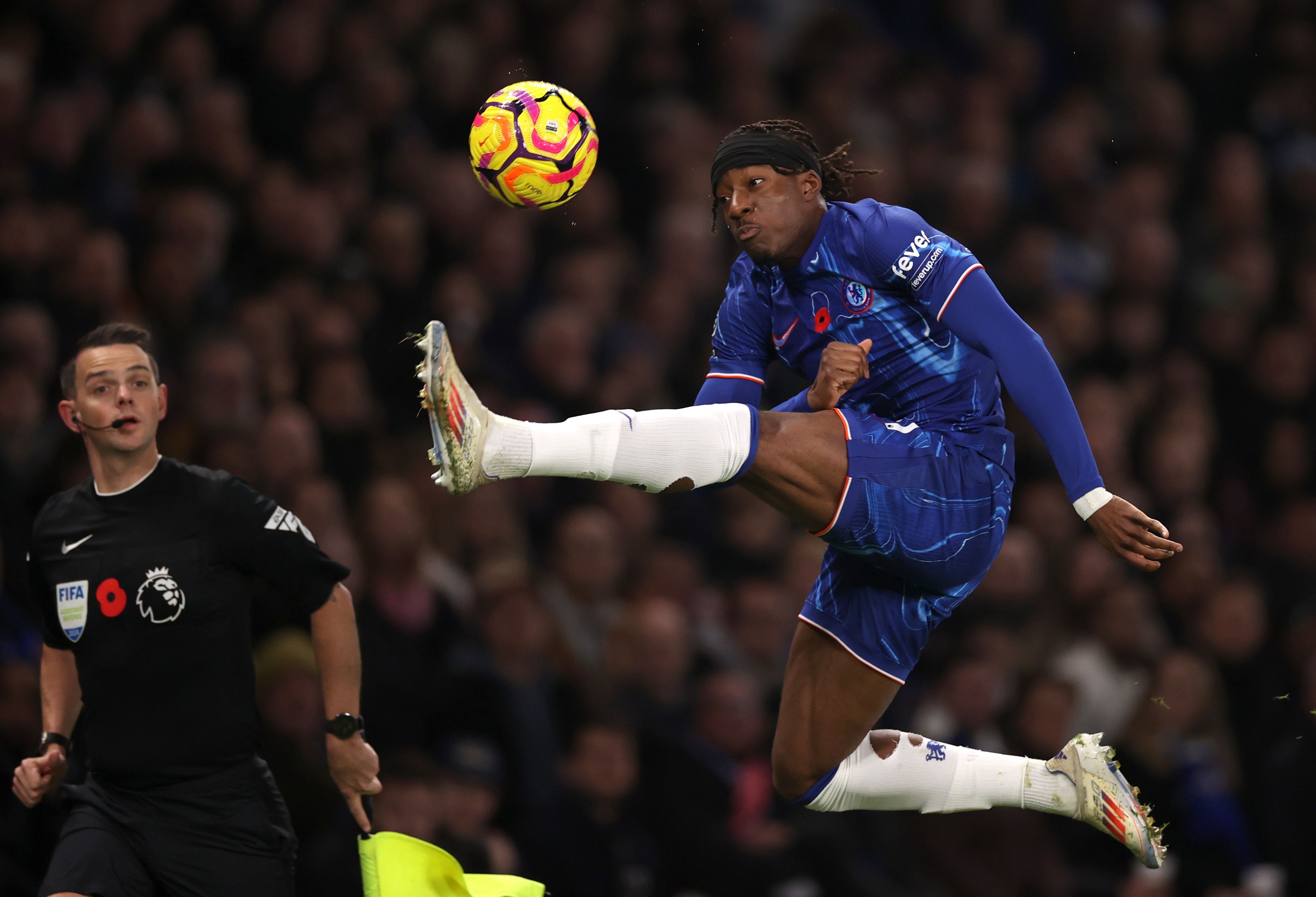 Noni Madueke controls a ball against Arsenal. (Photo by Ryan Pierse/Getty Images)