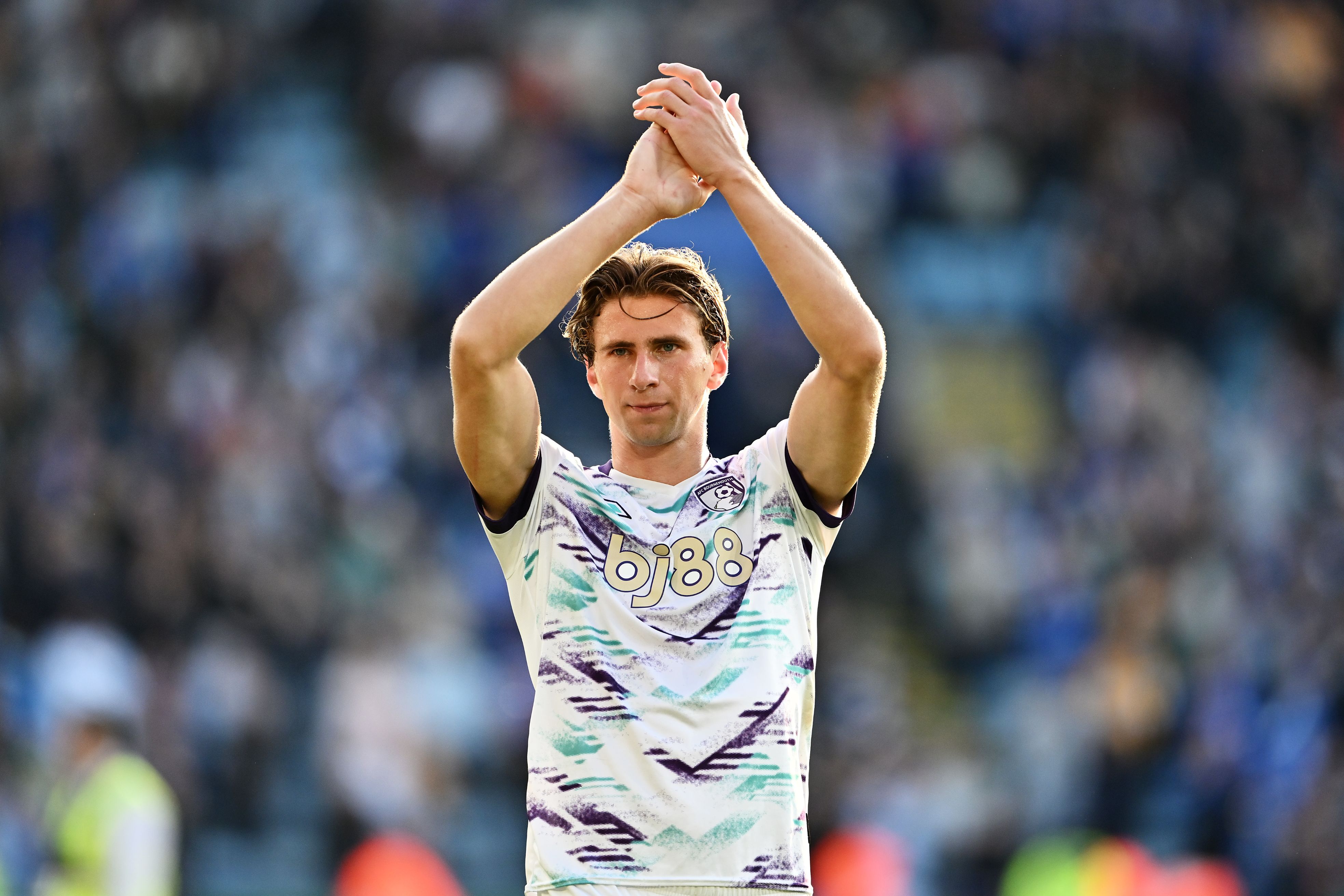 Ilyas Zabarnyi thanks the fans after leading Bournemouth to a win. (Photo by Dan Mullan/Getty Images)