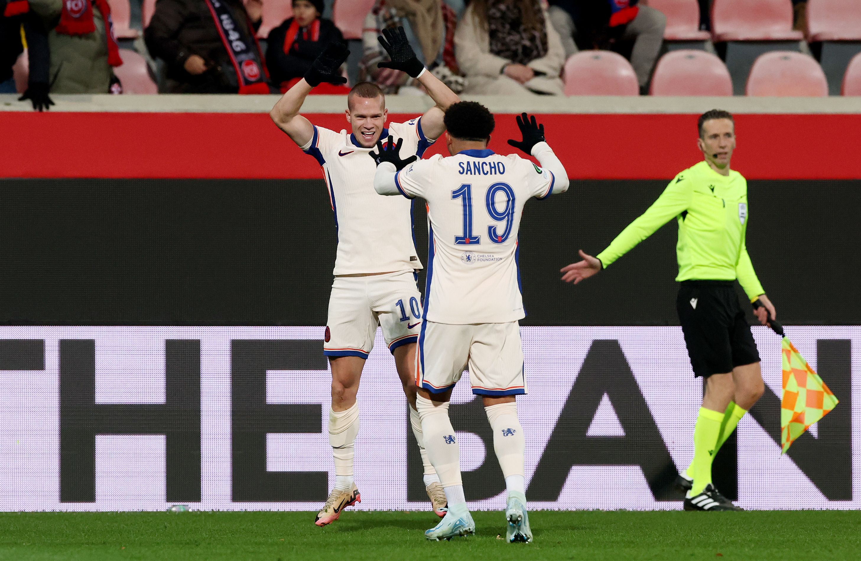 Mykhailo Mudryk and Jadon Sancho celebrate after a Conference League goal. (Photo by Alex Grimm/Getty Images)