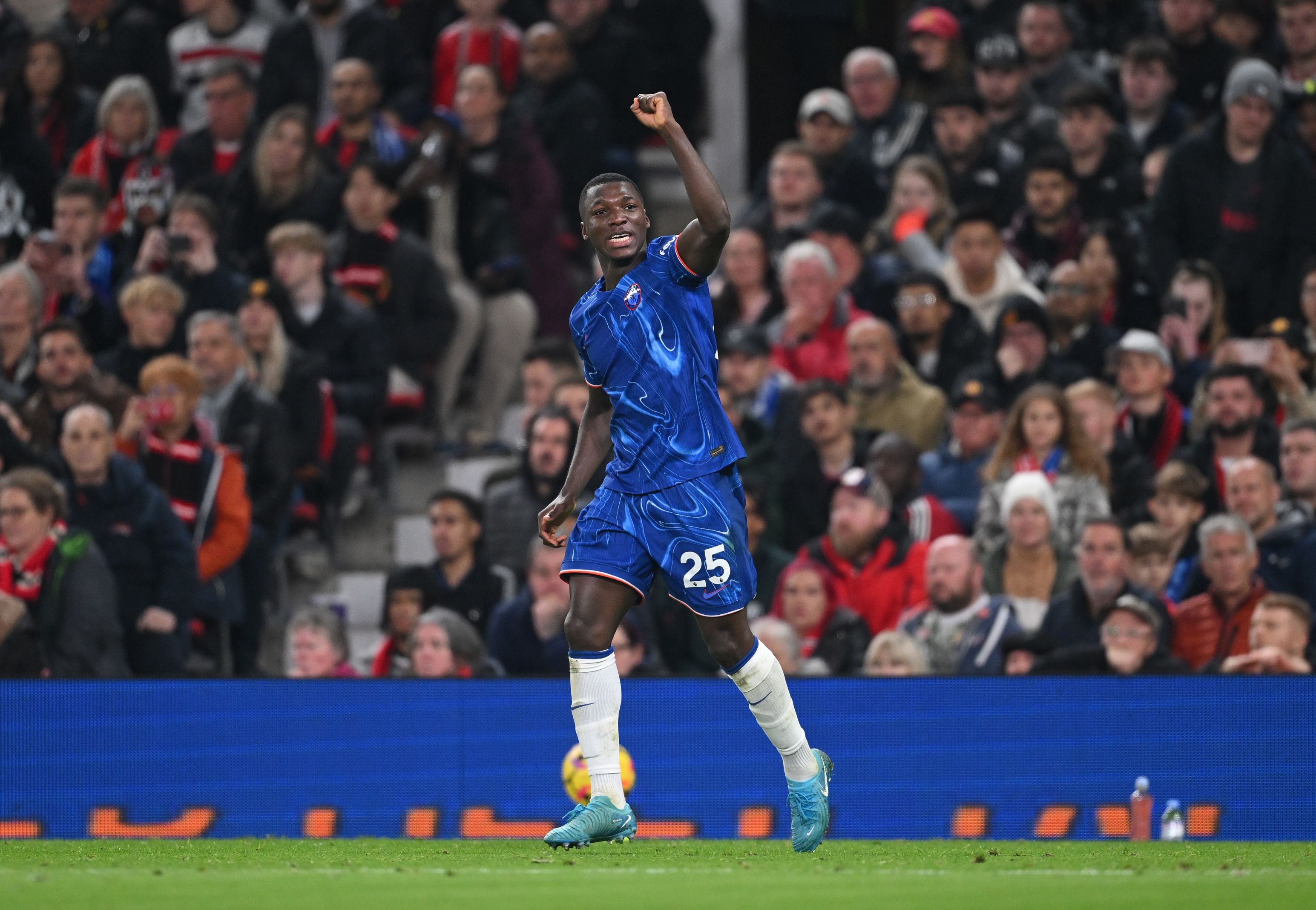 Moises Caicedo celebrates scoring against Manchester United.(Photo by Michael Regan/Getty Images)