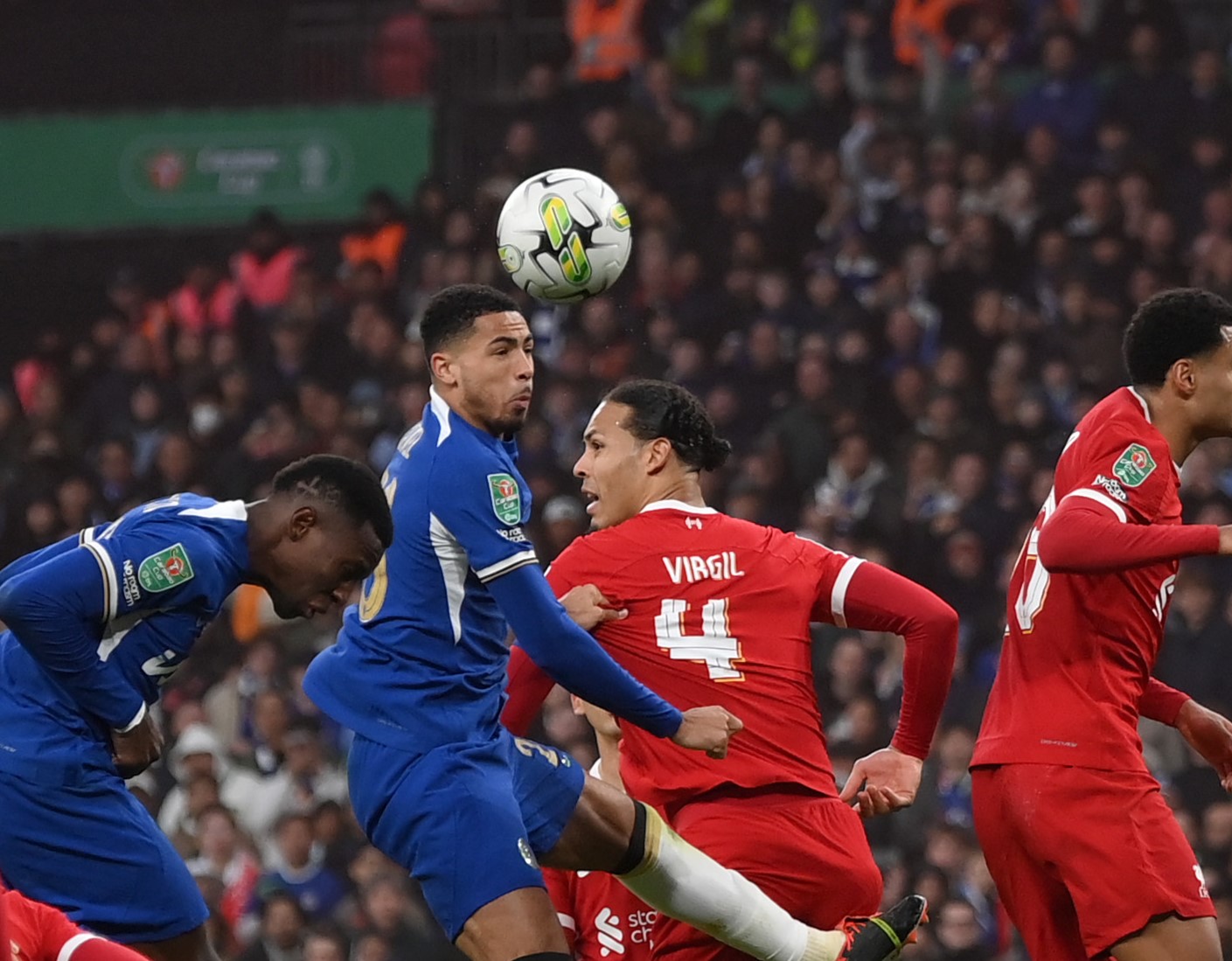 Levi Colwill challenges Virgil van Dijk for a header in the Carabao Cup final 2024. (Photo by Mike Hewitt/Getty Images)