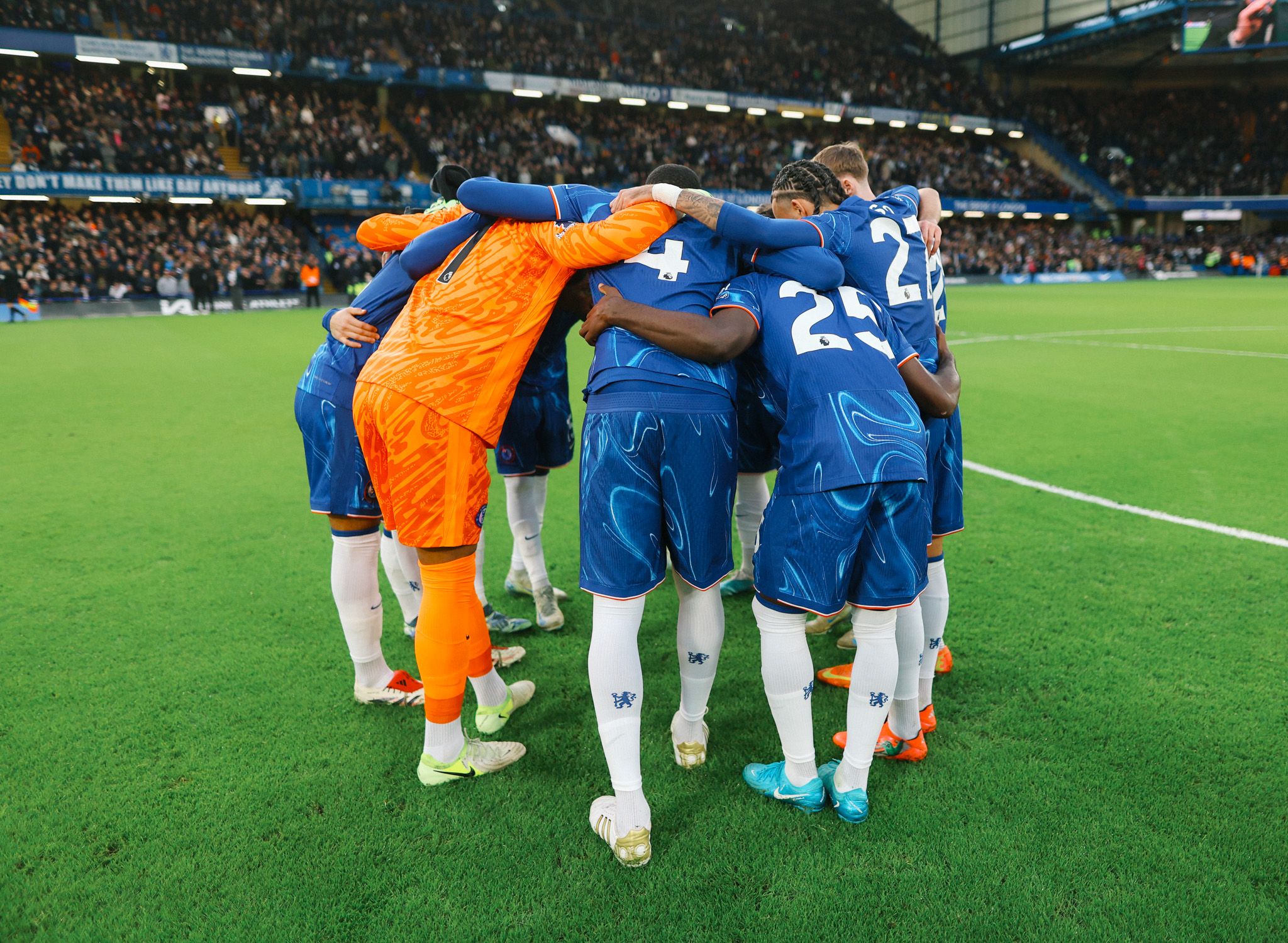 Chelsea in a generic group team huddle. (Photo by Darren Walsh/Chelsea FC)