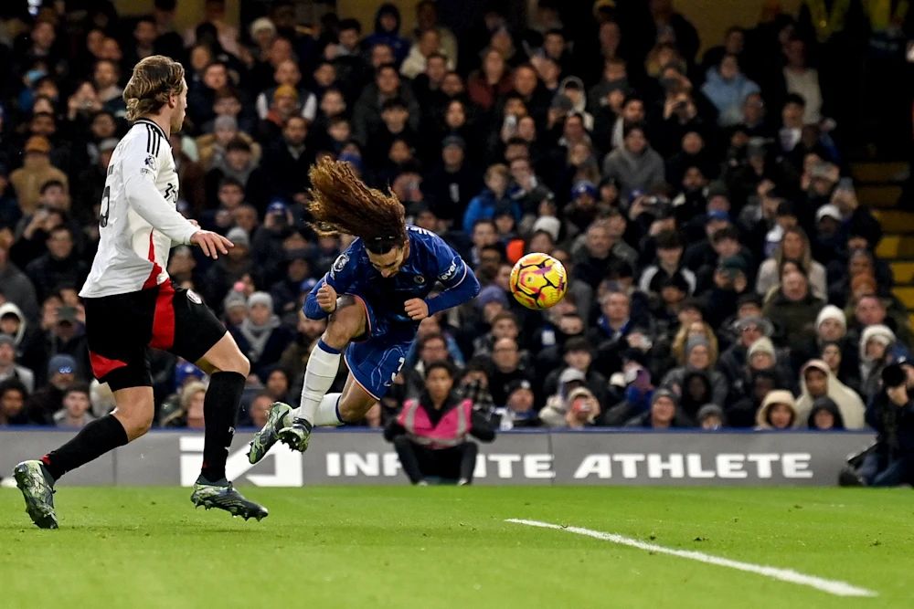 Marc Cucurella heads a ball into the ground. (Photo by Darren Walsh/Chelsea FC)