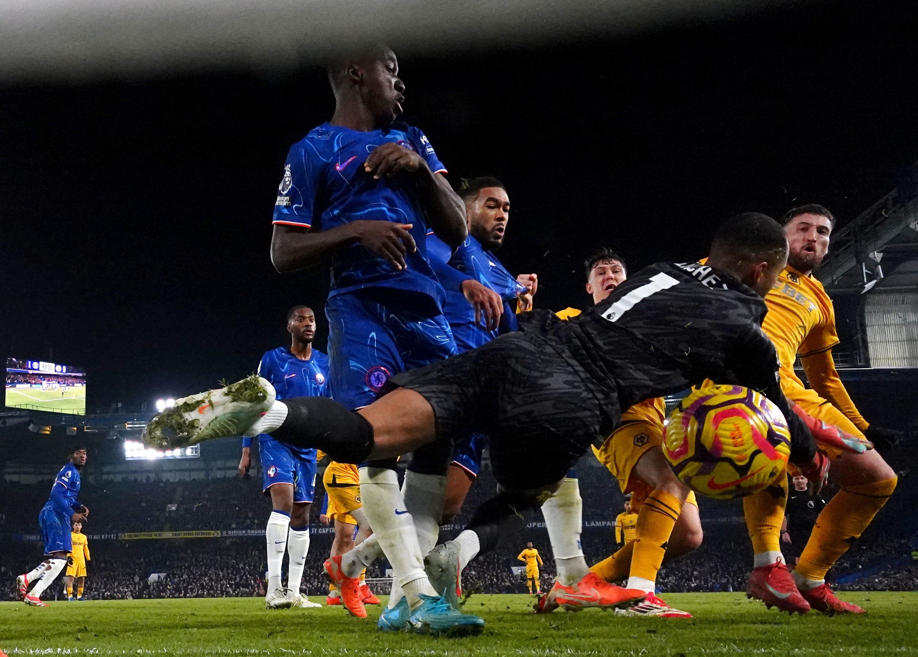 Robert Sanchez fumbles a ball from a corner which Wolves put into the net. (Photo by Darren Walsh/Chelsea FC)