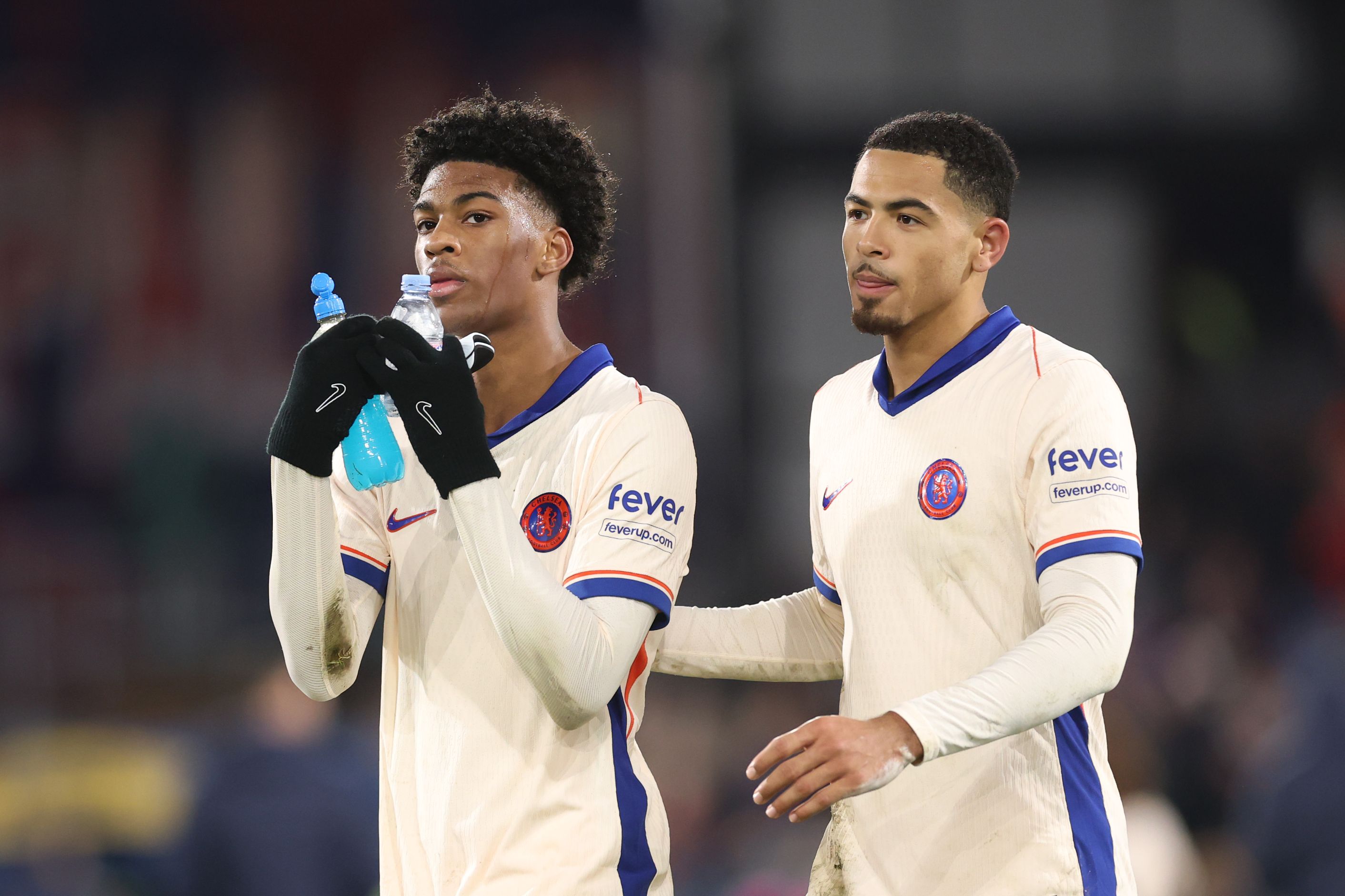 Josh Acheampong and Levi Colwill applaud the fans. (Photo by Julian Finney/Getty Images)