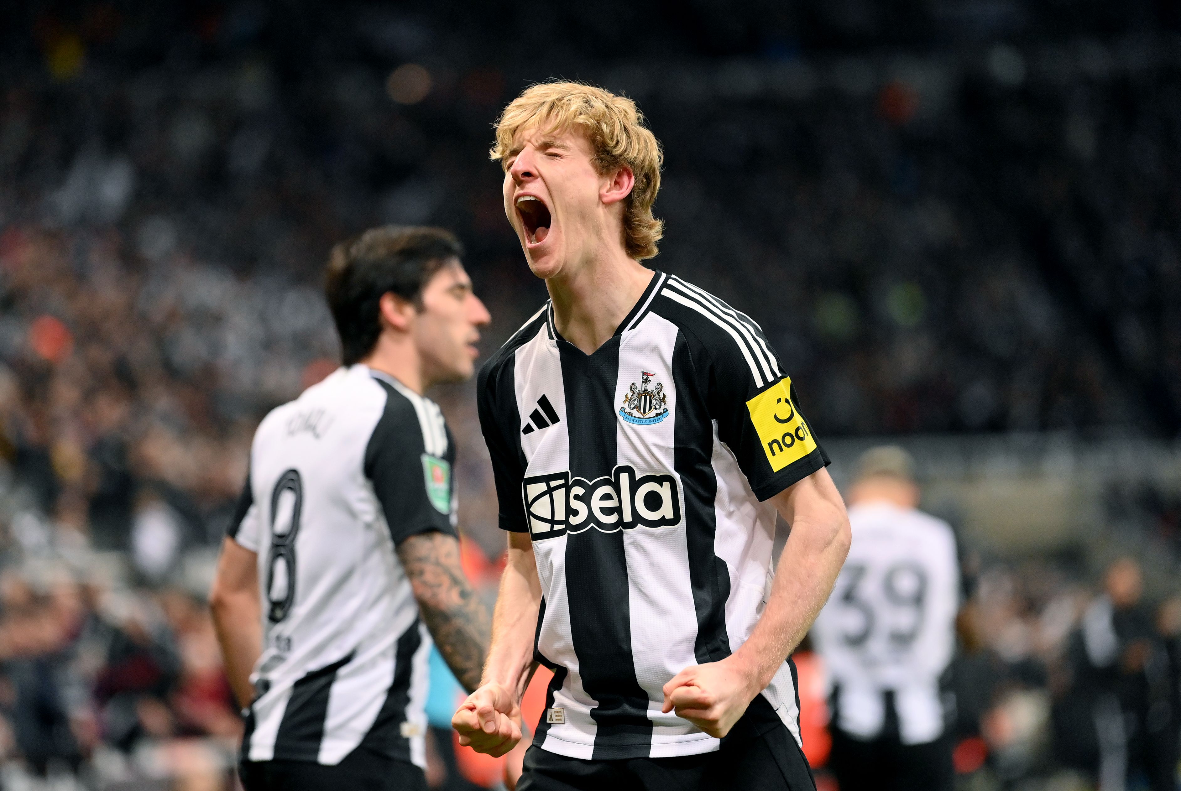 Anthony Gordon celebrates scoring for Newcastle.