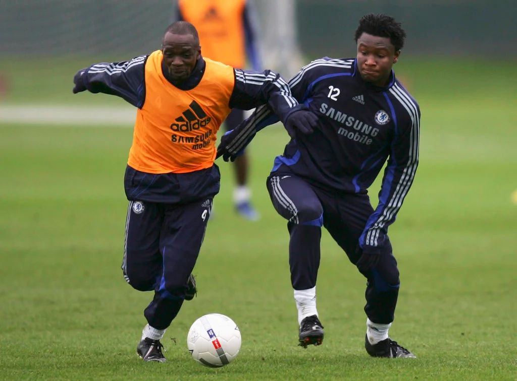 John Obi Mikel and Claude Makelele in training. (Photo by Paul Gilham/Getty Images)
