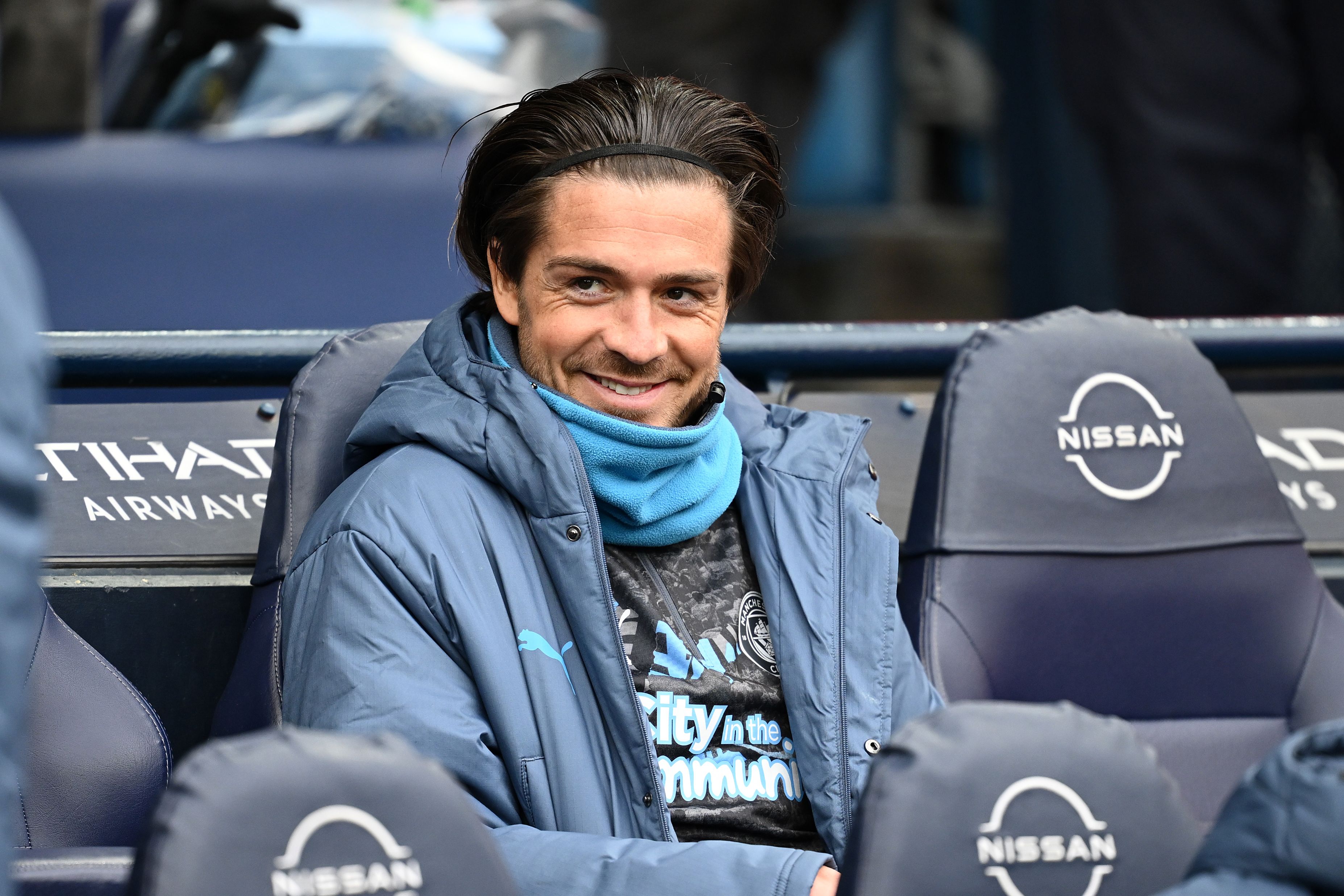 Jack Grealish on the bench at Manchester City.