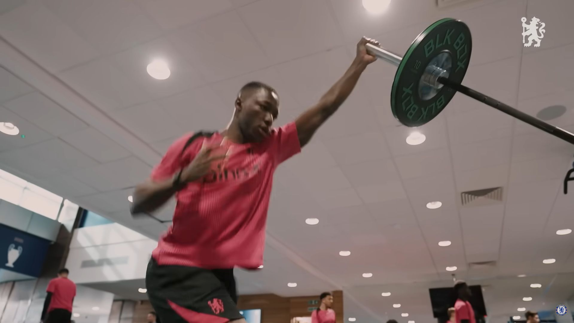 Moises Caicedo pumping iron in the gym.