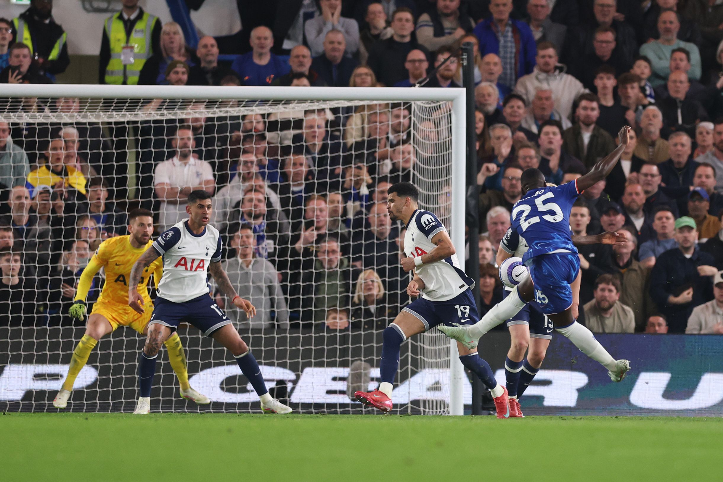 Moises Caicedo takes aim with a volley against Tottenham.