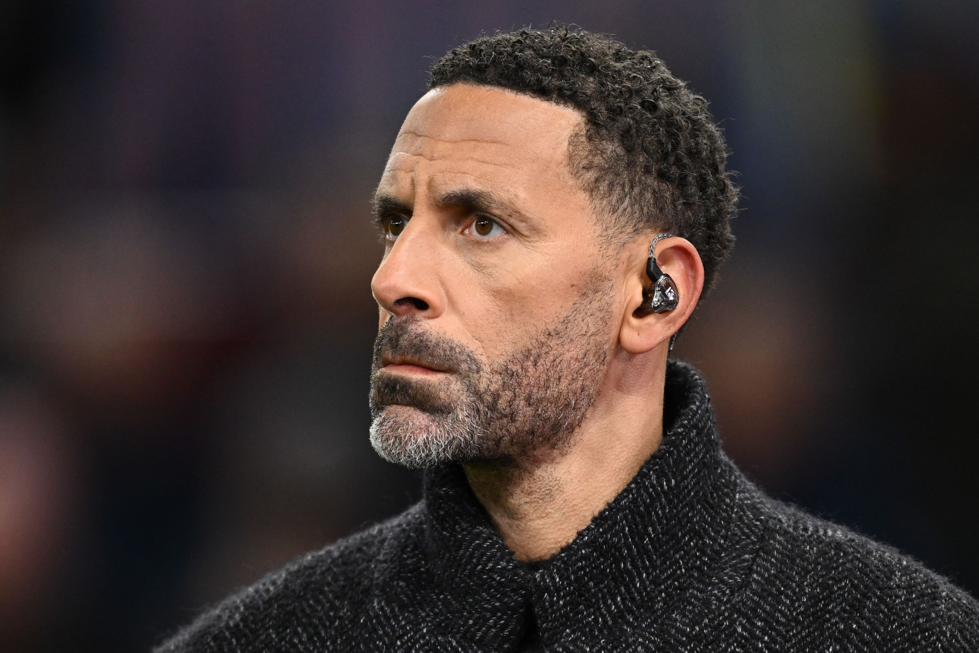 Rio Ferdinand doing punditry for TNT Sports.