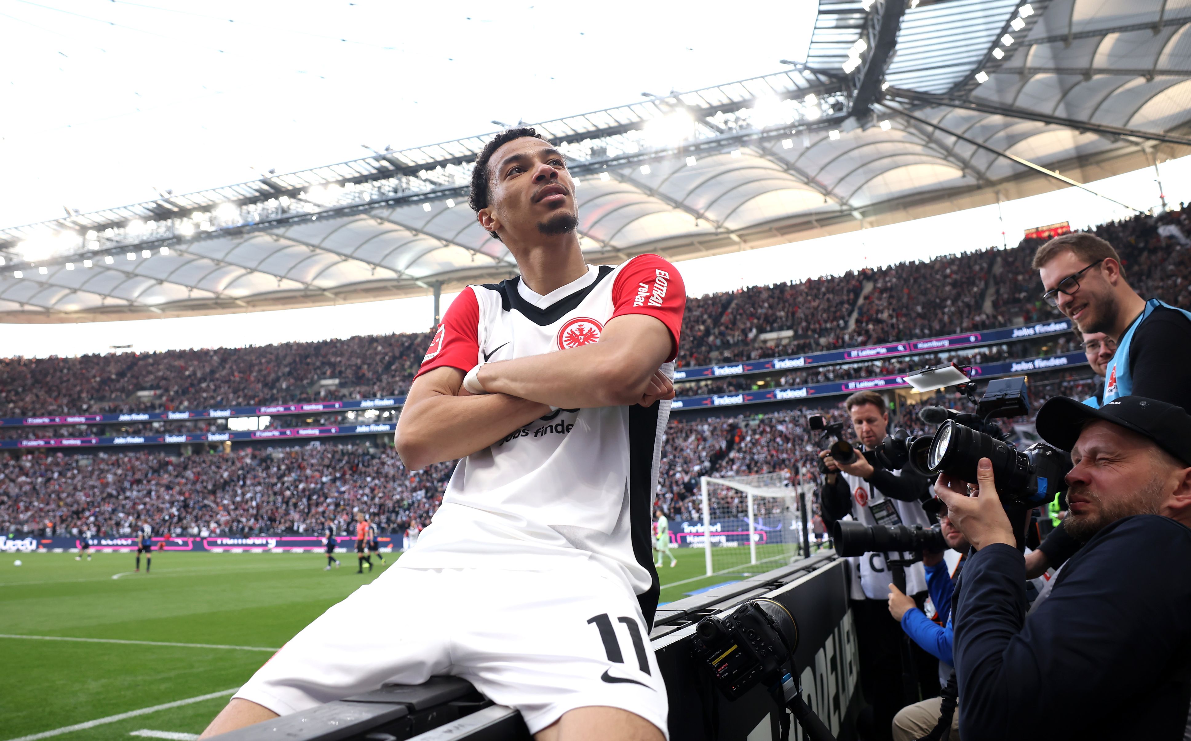 Hugo Ekitike celebrates scoring for Eintracht Frankfurt.