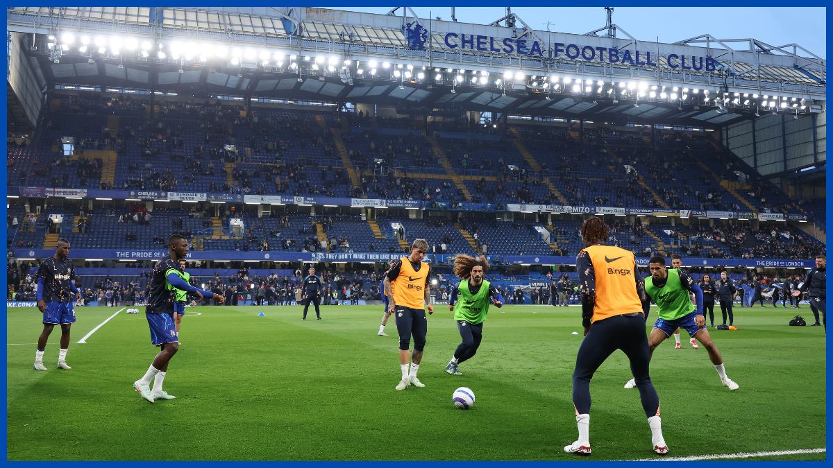 Chelsea players warm up at Stamford Bridge.