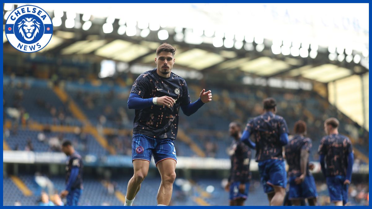 Chelsea players warm up at Stamford Bridge.