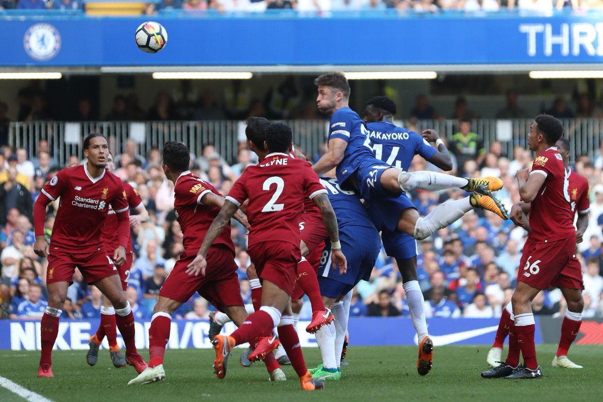 Gary Cahill heads a ball on target.