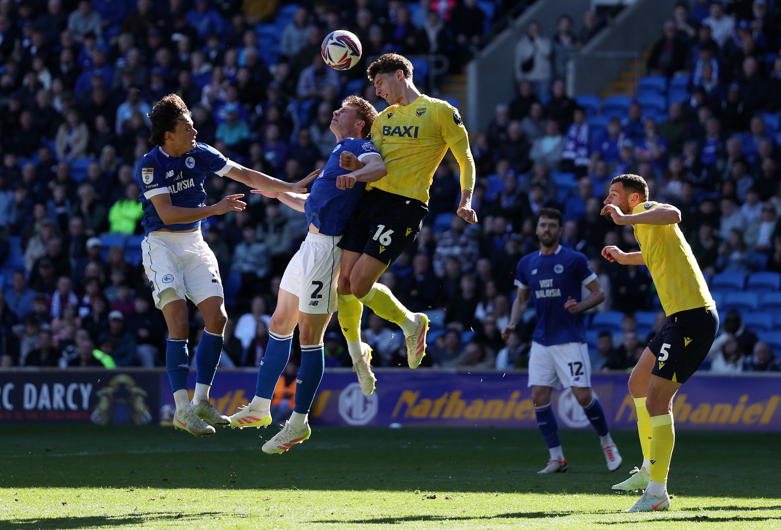 Ben Nelson battles for possession against Cardiff.