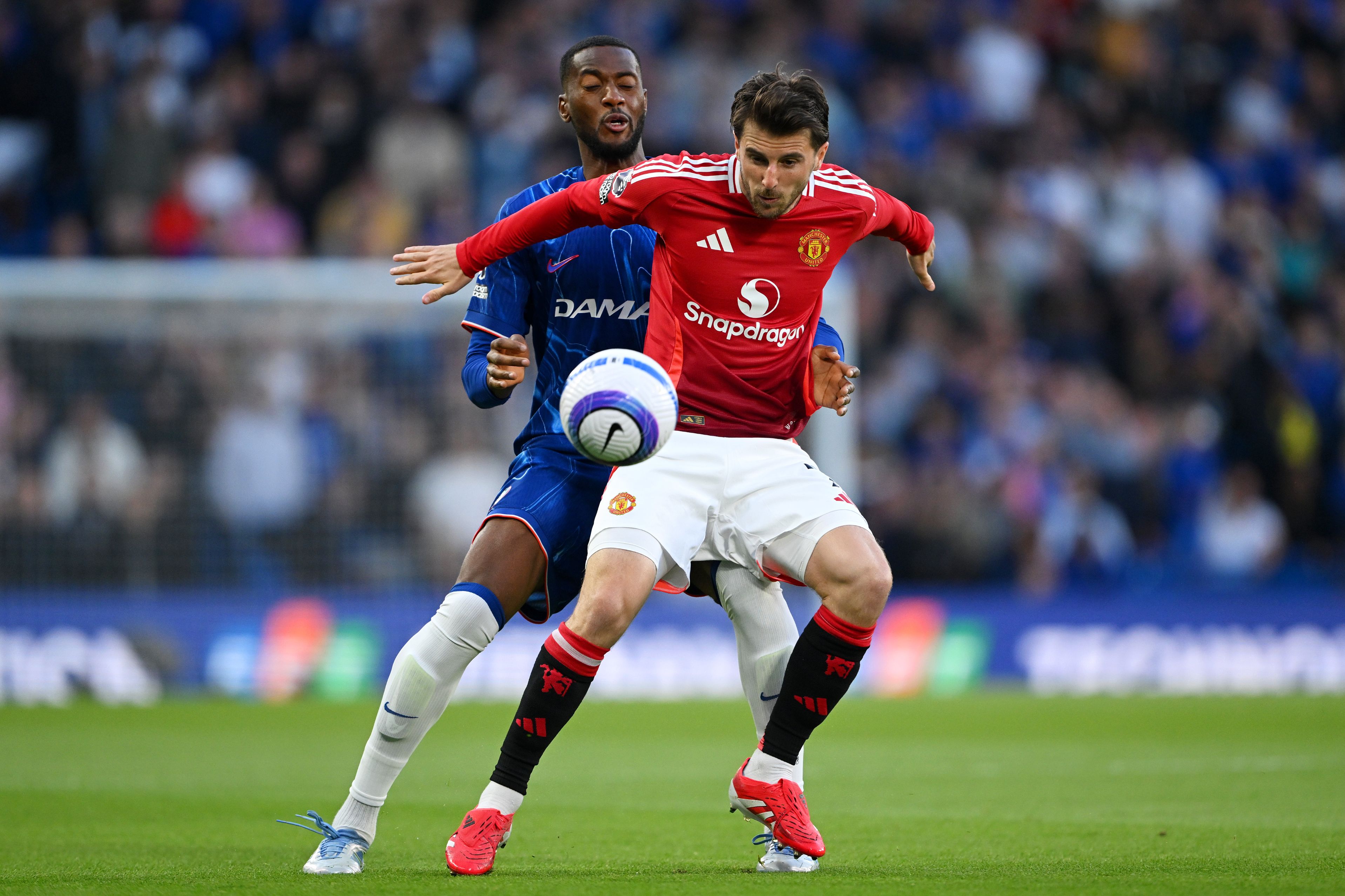 Mason Mount battles for possession against Chelsea.