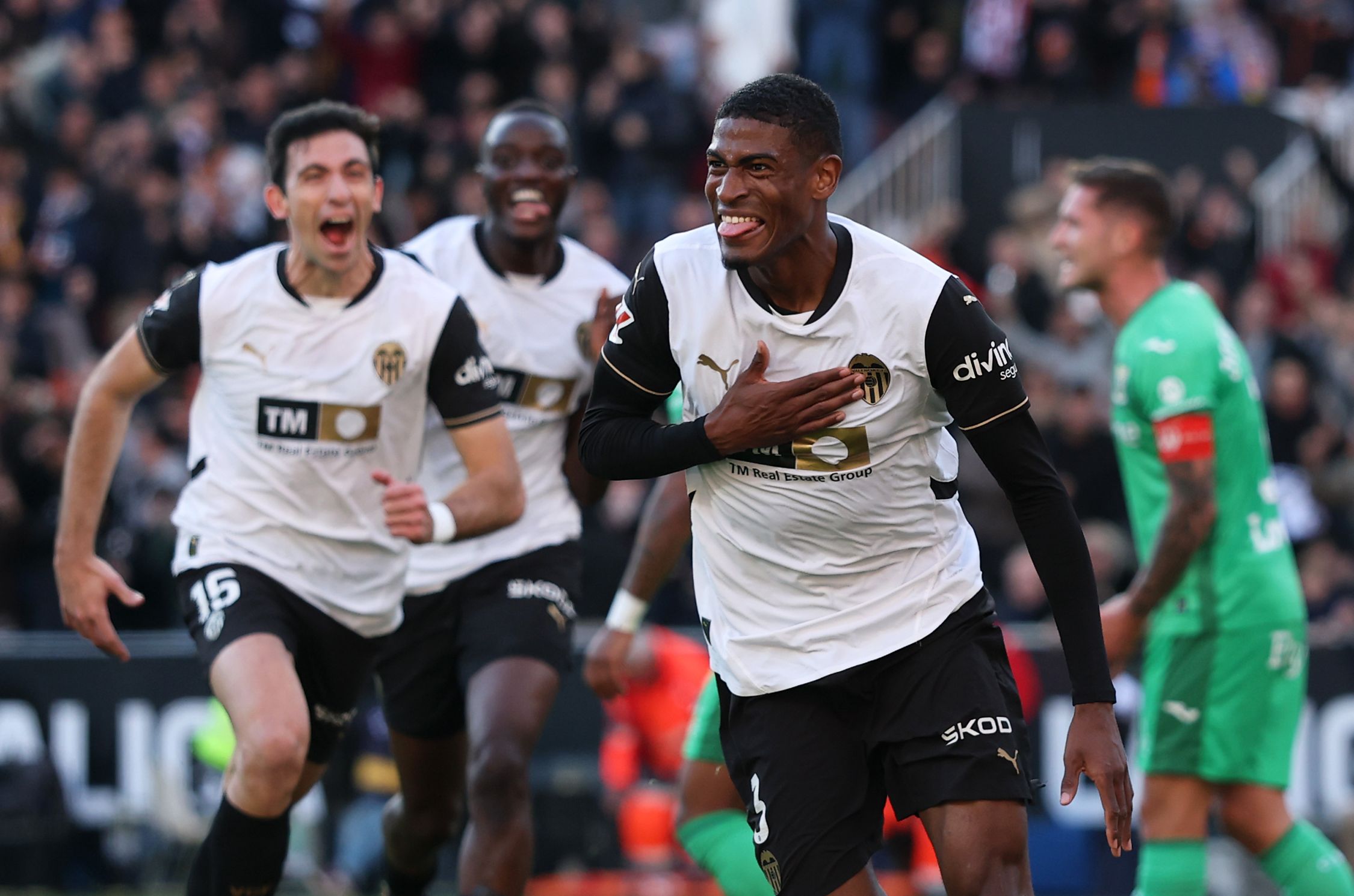 Cristhian Mosquera celebrates scoring for Valencia.