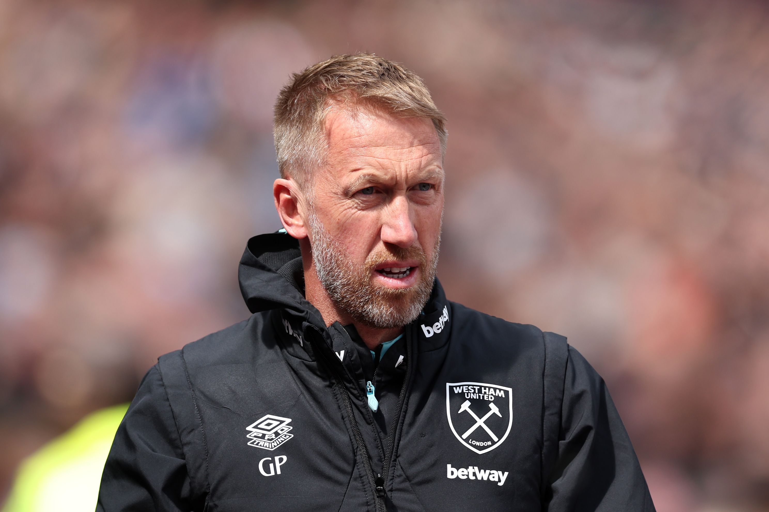 Graham Potter looks on during a West Ham match.