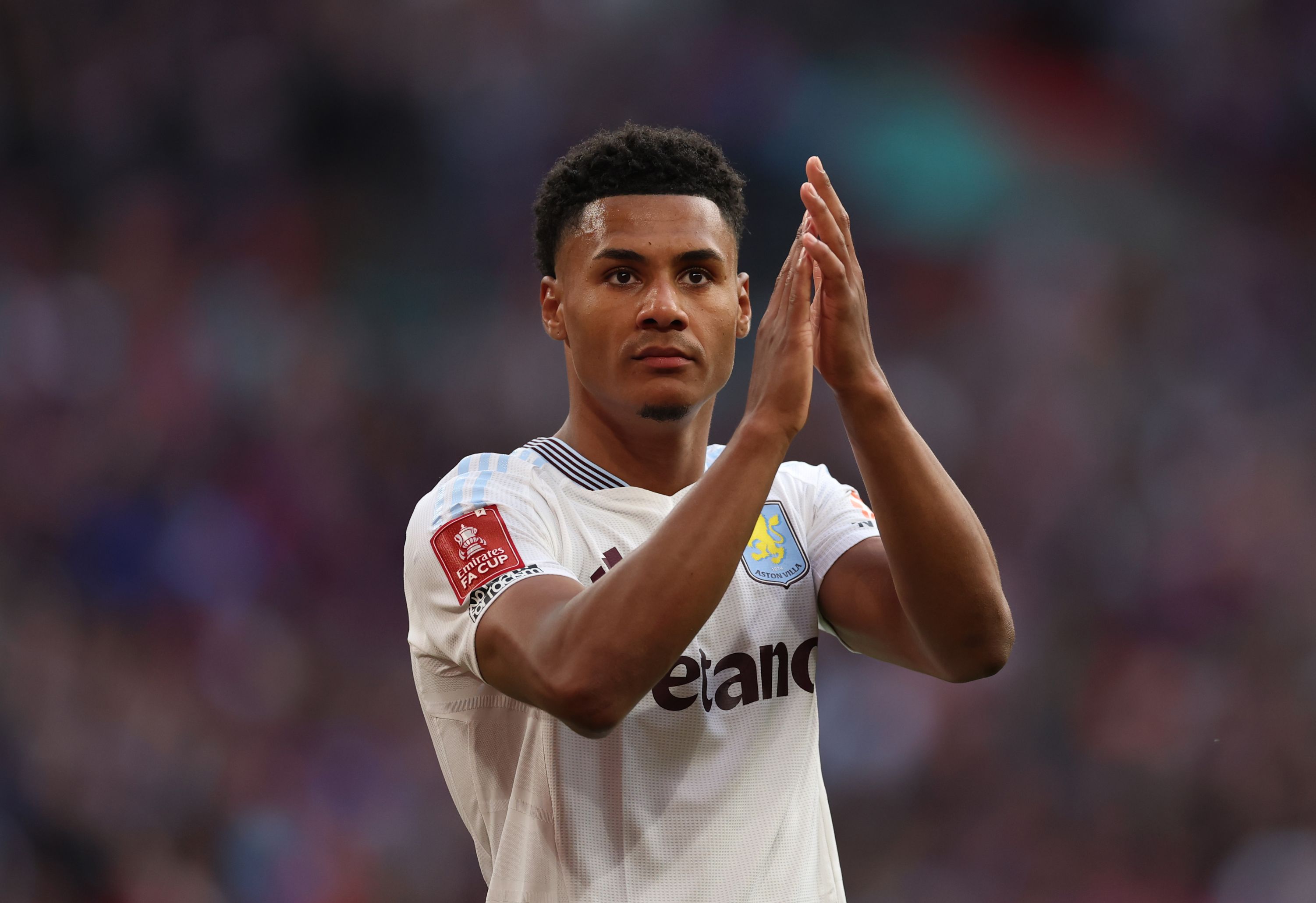 Ollie Watkins applauds the Aston Villa fans.