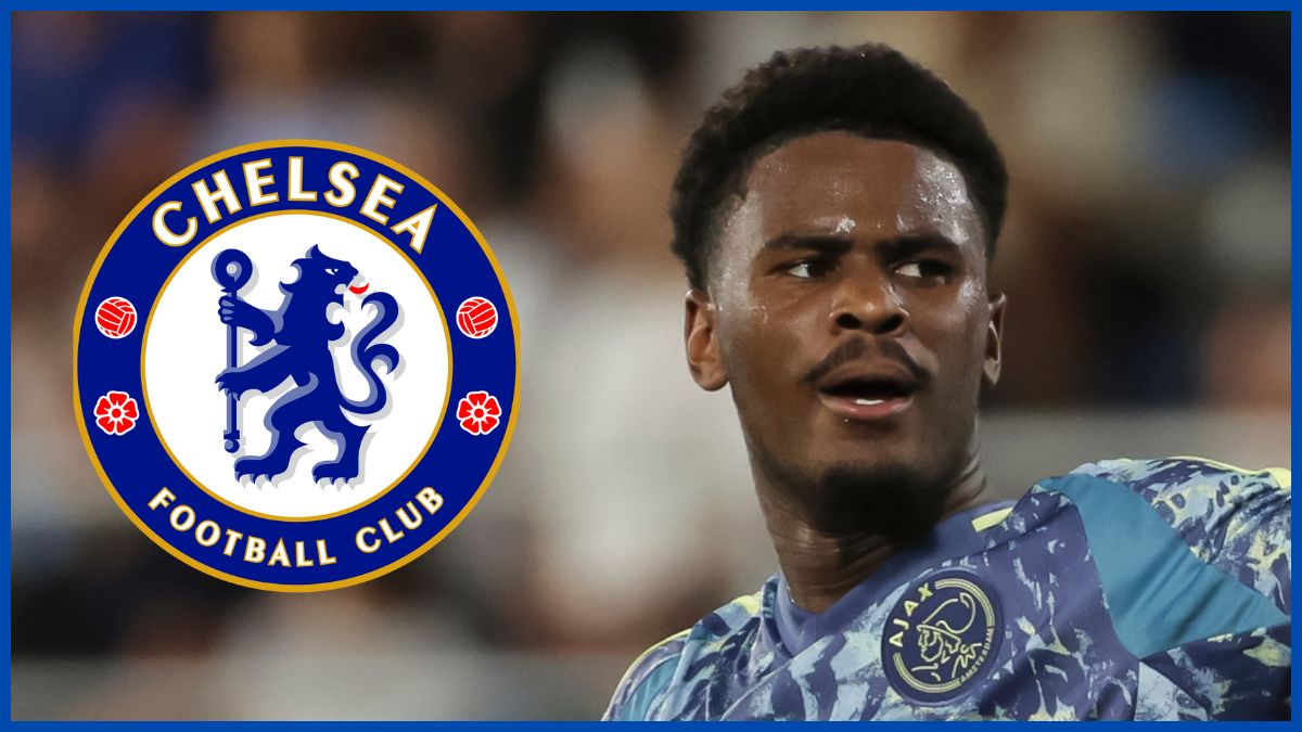 Jorrel Hato with a Chelsea logo.