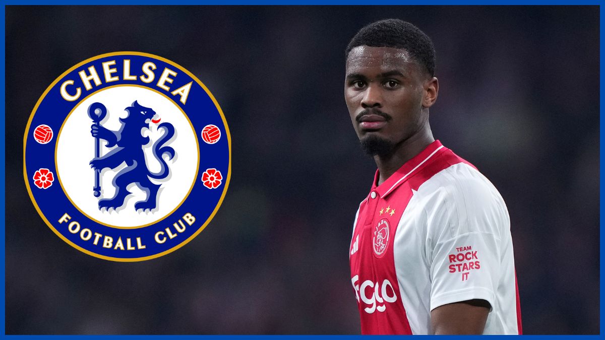 Jorrel Hato with a Chelsea logo. (Photo by Alex Bierens de Haan/Getty Images)