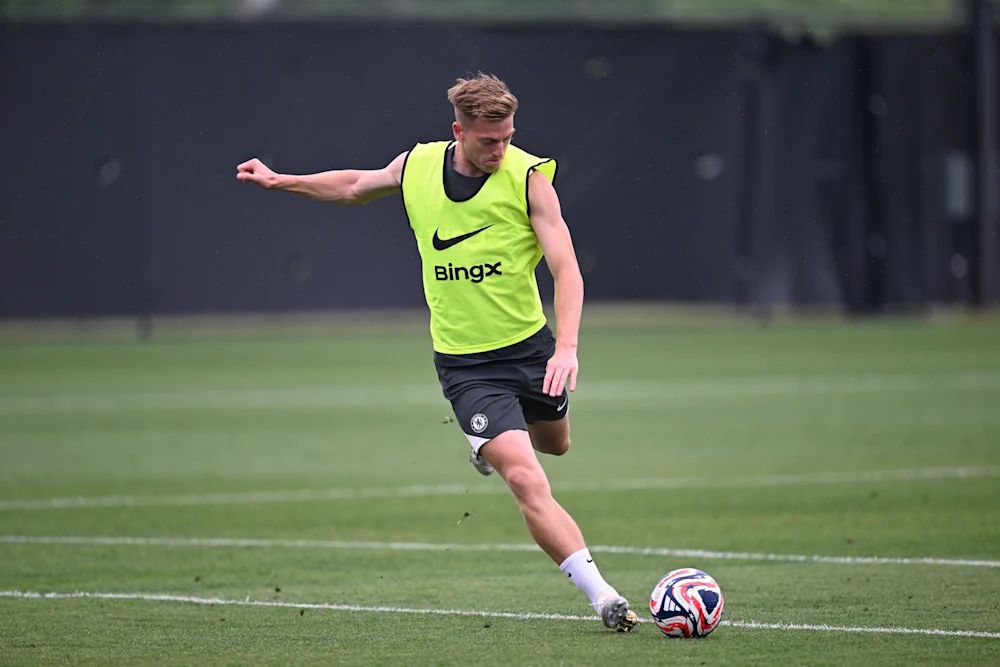 Liam Delap strikes a ball in training.
