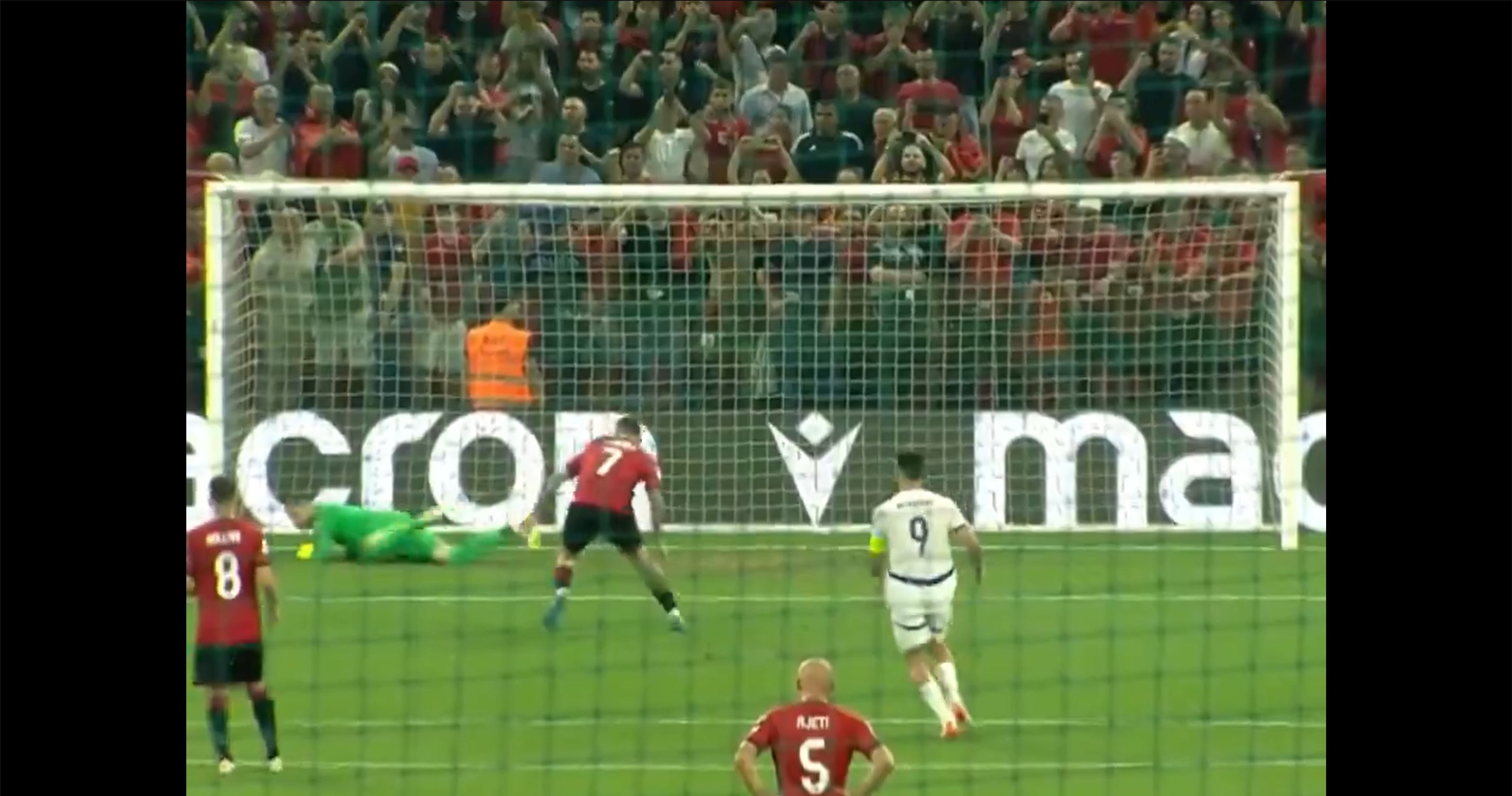 Djordje Petrovic saves a penalty from Rey Manaj.
